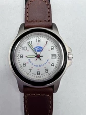 VINTAGE PFIZER “LIFE IS OUR LIFE’S WORK” SLOGAN WATCH –LEATHER -STAINLESS