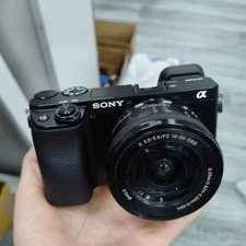 Sony Alpha a6100 24.2MP Mirrorless SLR Digital Camera W/ 16-50mm Lens -English