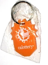 CALIFORNIA LOTTERY SCRATCHERS Sun Logo KEYCHAIN Collectible LUCKY CHARM Lotto