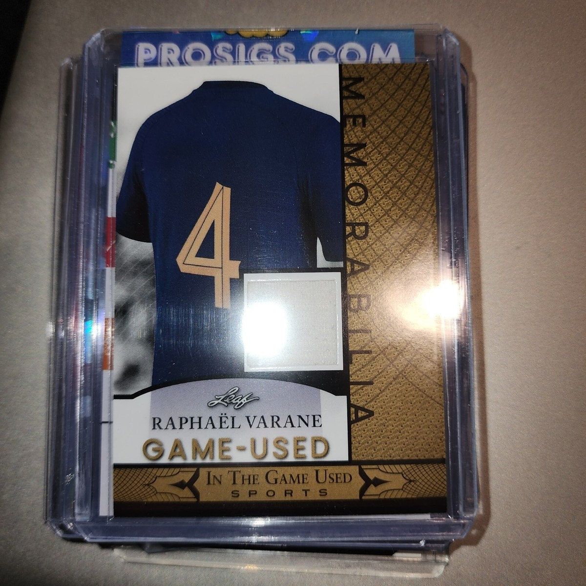 2024 LEAF GOLD IN THE GAME USED GUM-119 RAPHEL VARANE WHITE JERSEY 