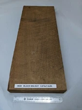 Black walnut plank 1-7/8" x 7-1/2 x 20". Rough sawn & sanded. 50 years of patina