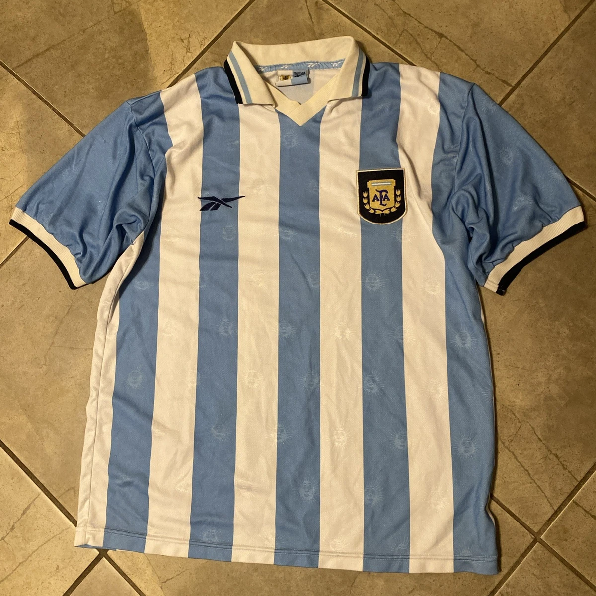 Preços baixos em Equipe Nacional Reebok Argentina Azul Roupas e
