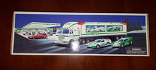Vintage Hess 1997 Toy Truck with Racers  in Box Never Used