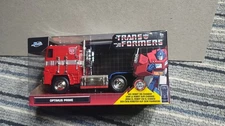 Transformers Optimus Prime Diecast 1:32 Scale Robot On Chassis Hollywood Rides