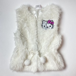 white fluffy vest