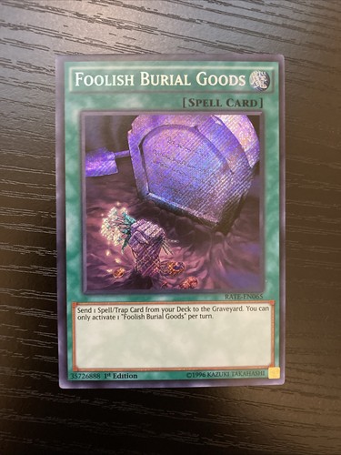 Foolish Burial Goods [1st Edition] RATE-EN065 YuGiOh Raging Tempest card