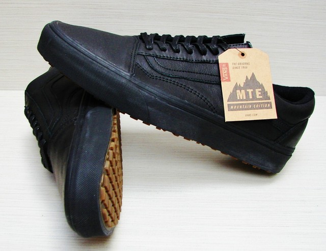vans black leather trainers