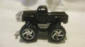 Old Style Ford Pick Up Monster Truck In A Black 132 Scale