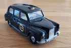 1986 VINTAGE CORGI TOYS No. 425/1 AUSTIN FX4 LONDON TAXI WITH OPENING REAR DOORS