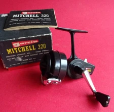 A SUPER LITTLE USED VINTAGE BOXED MITCHELL 320 SPINNING REEL