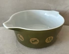 Vintage Pyrex Zodiac promotional casserole dish produced in 1961