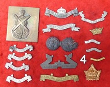 170 scrolls & badges for British & Canadian army badges. job lot