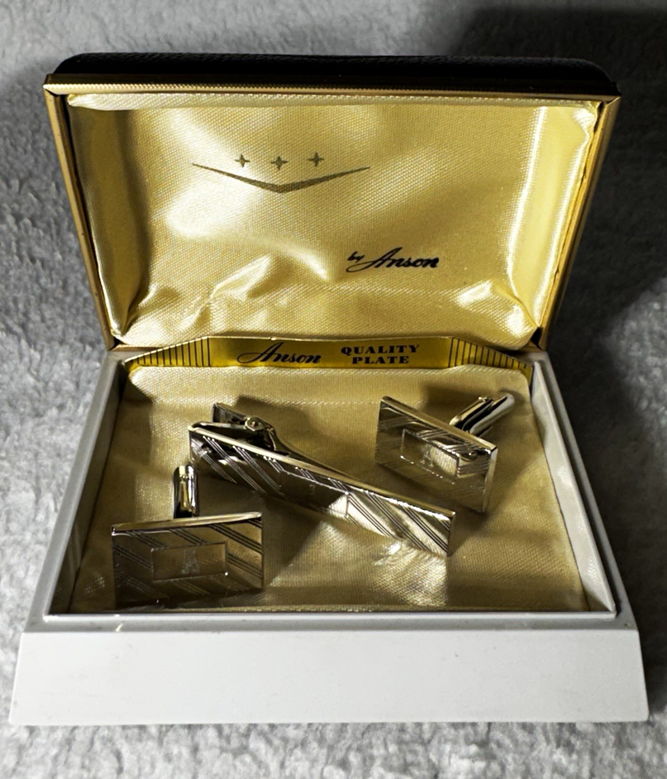 Vintage Anson gold-tone cufflinks and tie bar set with initial A, in original box