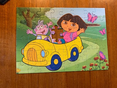 Dora & Land Before Time puzzles | eBay