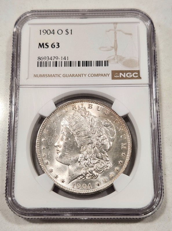 1904 O Morgan Silver Dollar NGC MS63 Rev Rim Toned