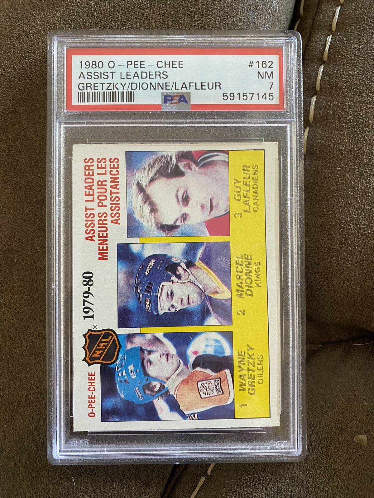 1980 WAYNE GRETZKY PSA 7 NM O-PEE-CHEE ASSIST LDRS HOF EDMONTON OILERS #162