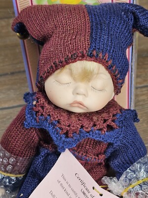 Cathay Collection Porcelain Doll Baby Eyes Closed Jester Doll