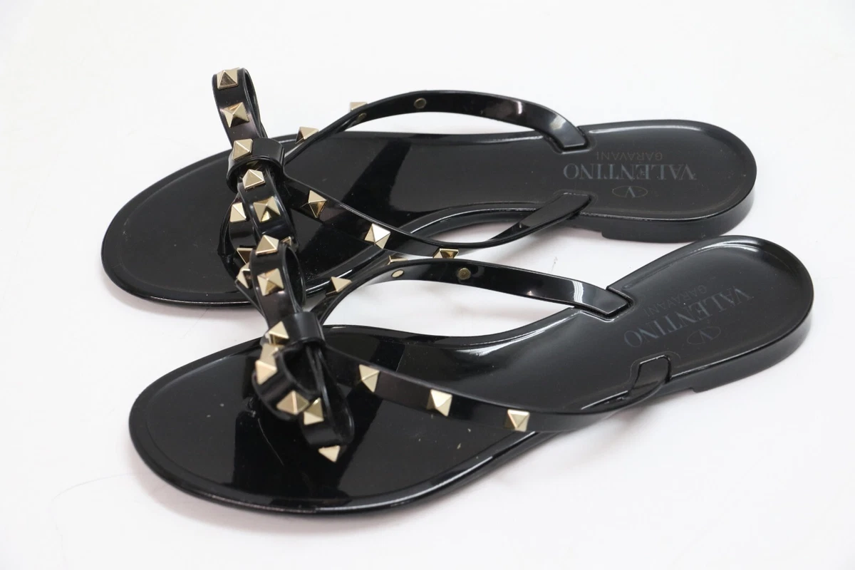 Valentino garavani rockstud sales bow jelly thong sandals