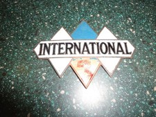 Nice 1937-39 International C-1 Truck Porcelain Grille Emblem Name Badge