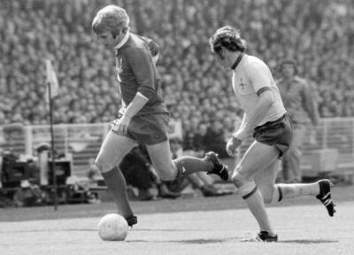 Alun Evans of Liverpool is watched by Bob McNab of Arsenal during - Old Photo