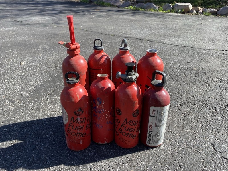 8 MSR Fuel Canisters and 2 Pumps