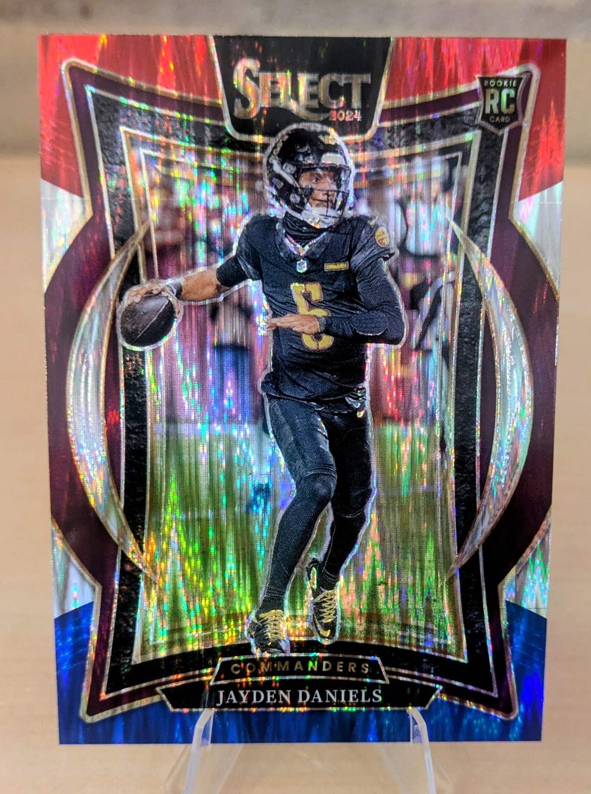 2024 Panini Select - Concourse Jayden Daniels #26 Red & Blue Shock Prizm (RC)
