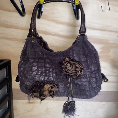 Furry feathery witth flowers hand bag. different and unique.