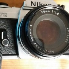 Nikon FG 35MM Film Camera  Lens, flash, case. NEW condition.