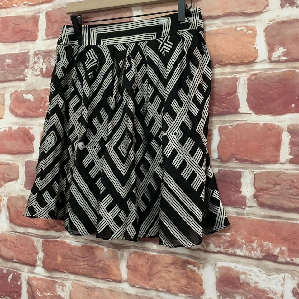 Falda para mujer Antonio Melani 4 negra plateada abstracta a rayas informal con cremallera Foto 2 de 4