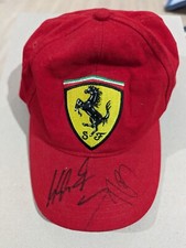 Michael Schumacher and Rubens Barrichello dual signed Ferrari cap. JSA. Rare