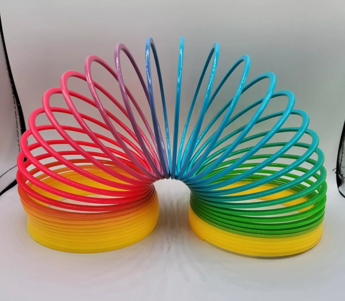 Large Rainbow Slinky Spring Coil Fun Kids Toy Stretchy Bouncing Plastic Slinky