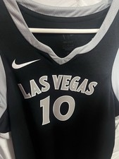 is a Nike A'ja Wilson Las Vegas Aces WNBA Victory jersey in black and flat silve