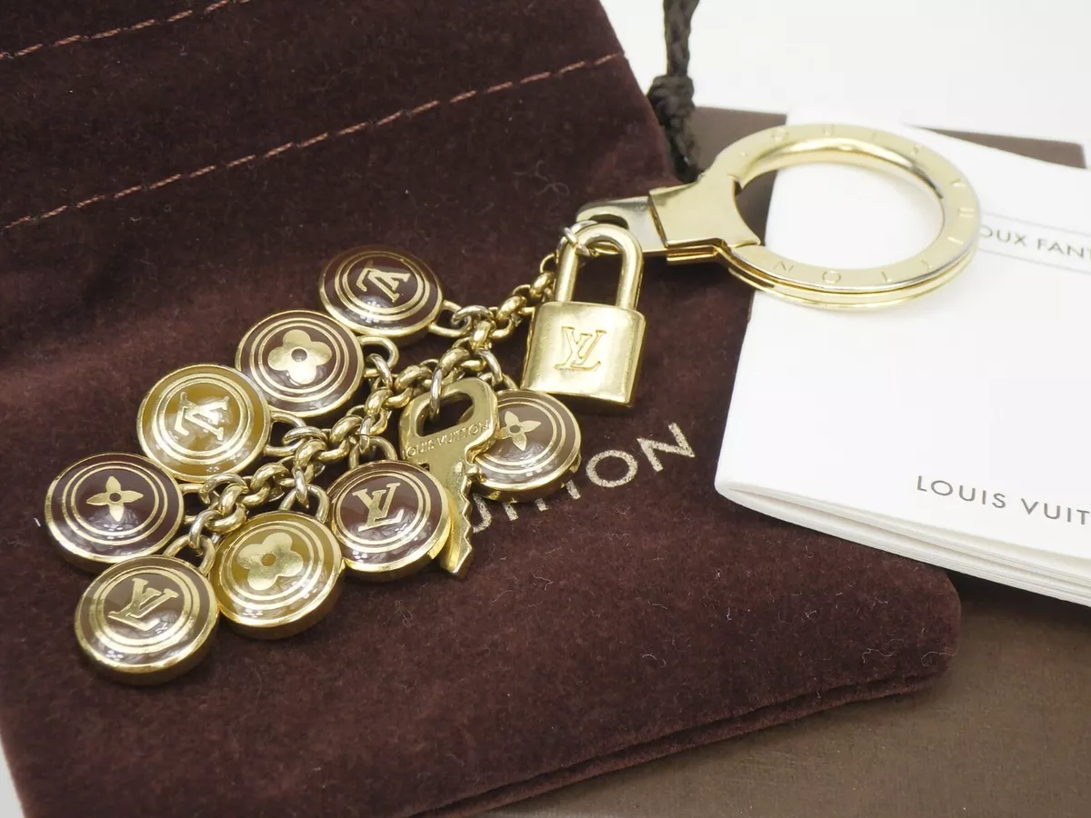 Louis Vuitton Bag Charm Key Holder LV Circle Gold in Brass with