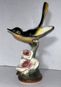Vintage 10” Black Yellow and White Bird Figurine Ceramic On Flowers - Unbranded