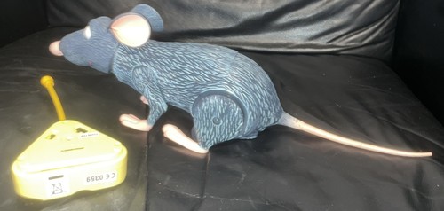 RARO TELECOMANDO DISNEY PIXAR RATATOUILLE REMY CON BATTERIE E FUNZIONANTE - Foto 8 di 10