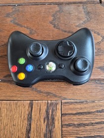Xbox 360with Black Console Controller And Plugs