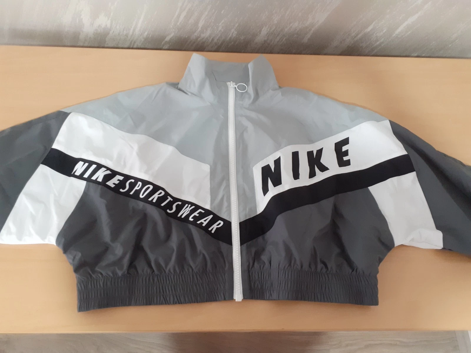 Nike Streetwear woven jacket in grey and blue
Opens in a new window or tab