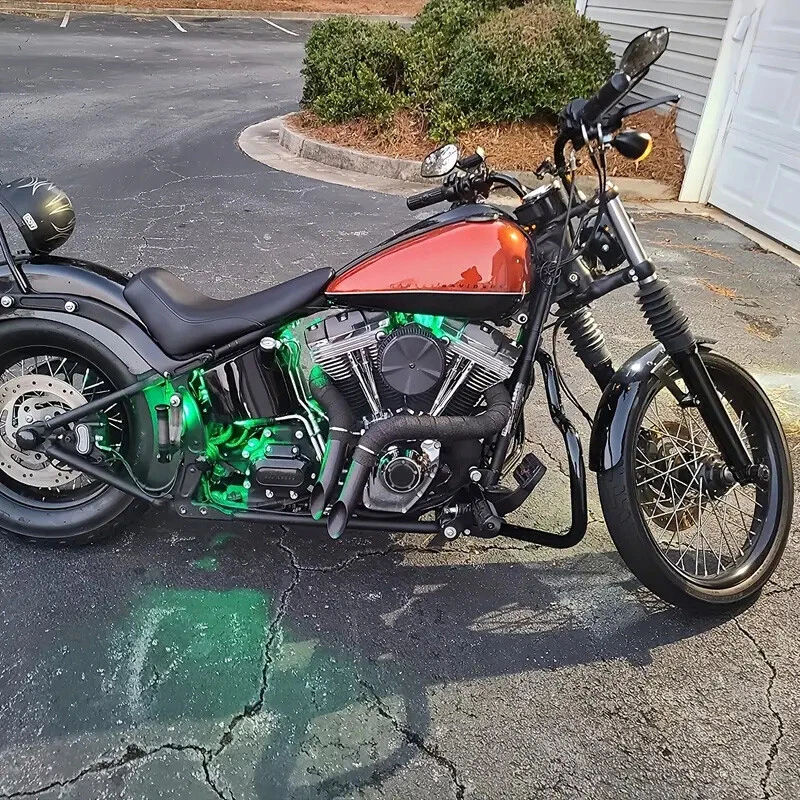 Tubos de escape LAF de 2" con kits de brida para Harley Sportster Touring envueltos en negro. Foto 2 de 4