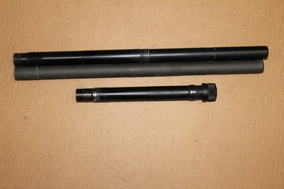 3 mystery 12 gauge shotgun tubes.