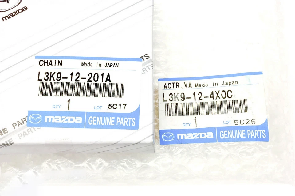 Actuador de cadena de correa de distribución Mazda 3 CX7 VVT y cadena de correa de distribución de válvula de 2,3 L OEM Foto 4 de 4