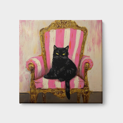 Süße wütende schwarze Katze sitzt auf rosa antikem Stuhl Leinwandbild Wandbild