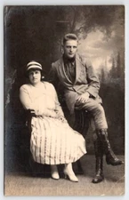 RPPC Attractive Young Man Tall Work Boots Lovely Lady Studio Photo Postcard Q22