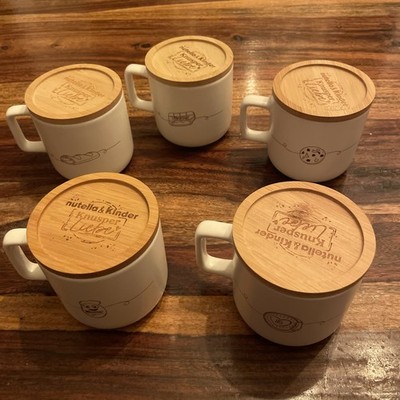 Set: 5 x Nutella und Kinder Knusper Liebe Tassen - versch. Designs - Aktion 2026