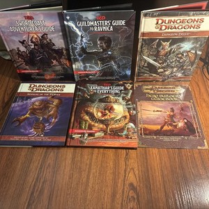 Lot of 7 DnD Hardcover/softcover Guide to Ravnica D&D 5e, Delve 4e D&D Etc.