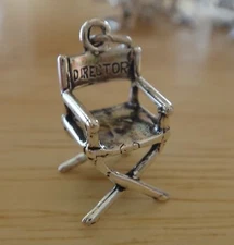 Sterling Silver say Director on front Universal Studios on back Director's Chair