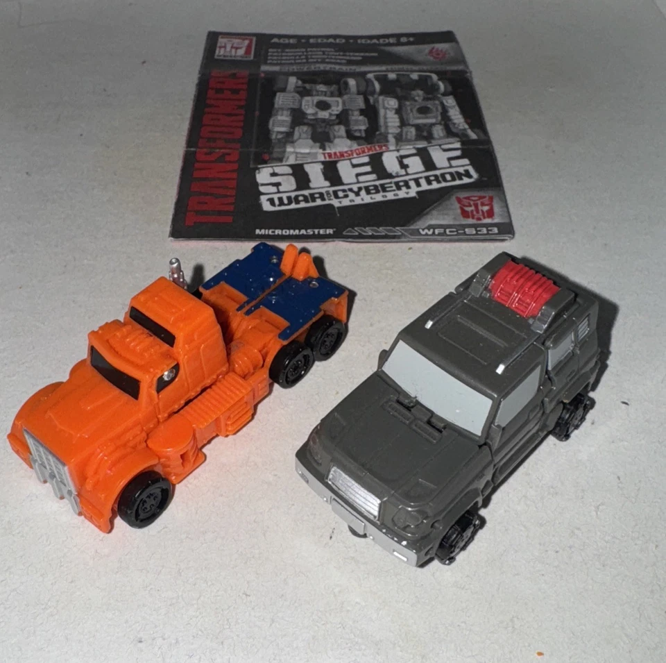 Transformers Powertrain & Highjump Siege Micromasters Off-Road Patrol 100% Foto 2 de 4