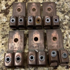 (6)- ILSCO 4/0-2 DOUBLE COPPER LUGS. REMOVED FROM AN EXISTING PANELBOARD