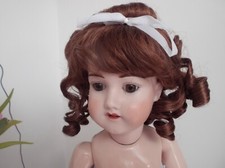 12 INCHAUBURN SHOULDER LENGTH CURLY WIG WITH BOW DETAIL ELSIE