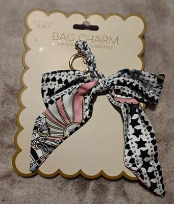 blue moon studio bow bag charm, white, navy blue, pink with gold clip