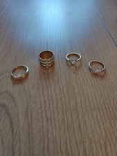 NEW X4 COSTUME RINGS GOLD PRIMARK